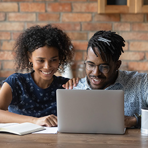 young couple with laptop